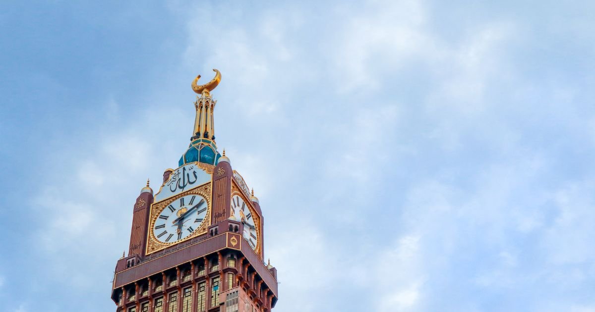 Close-up of the Makkah Royal Clock Tower (Abraj Al Bait) in Mecca, a sight included in all our value-driven cheap Umrah packages UK.